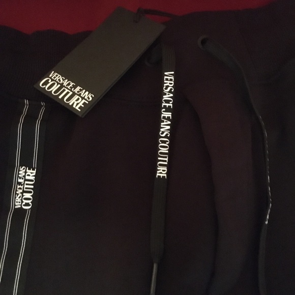 Versace Jeans Couture joggers. Size XL. Waist 36. Zipper pockets. Logo stripes. - Picture 2 of 6